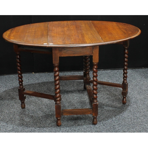 265 - An oak gateleg dining table; a set of three elm country kitchen dining chairs; a pair of Arts & Craf... 