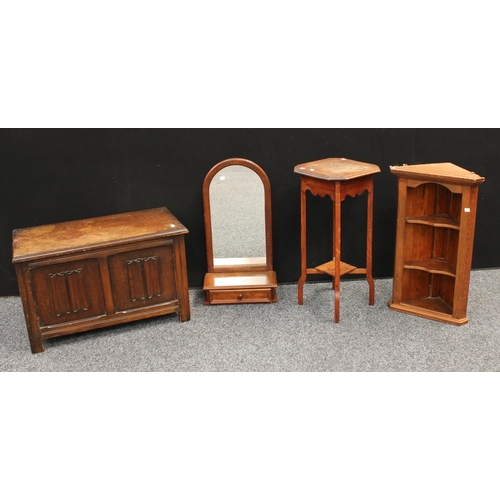 269 - A small oak open corner cupboard; blanket chest; occasional table; mirror (4)