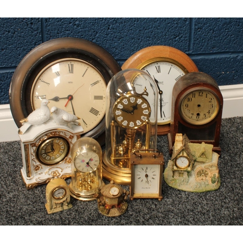 464 - A brass anniversary clock, other wall clocks, carriage clock, decorative mantel clocks; qty