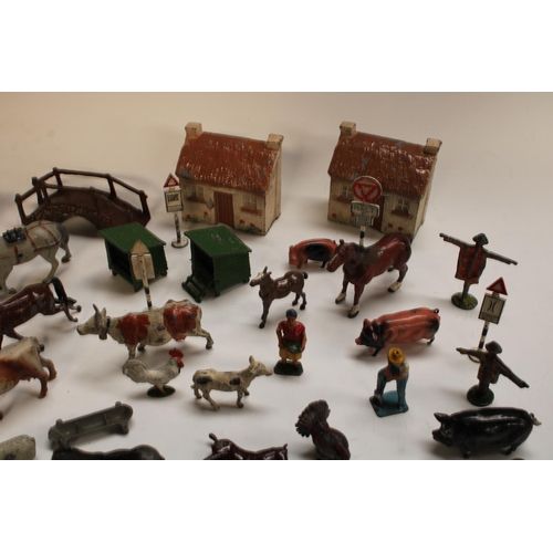 483 - Britains Toys - a cold painted lead farmyard collection, inc two cottages, assorted Cows, Horse, Pig... 