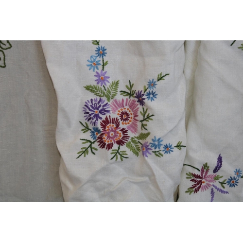 492 - Textiles - hand embroidered floral and lace edged linen tablecloths