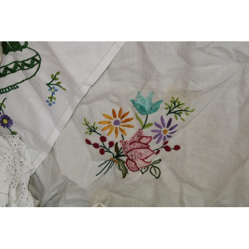 492 - Textiles - hand embroidered floral and lace edged linen tablecloths