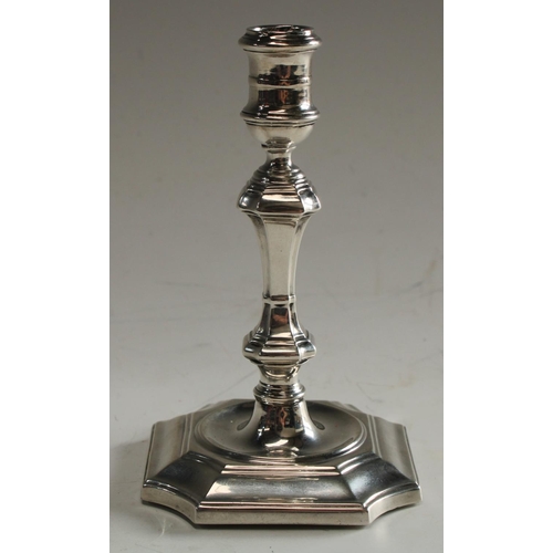 5032 - An Edwardian silver taperstick, in George I style, Sheffield 1902, 11cm high