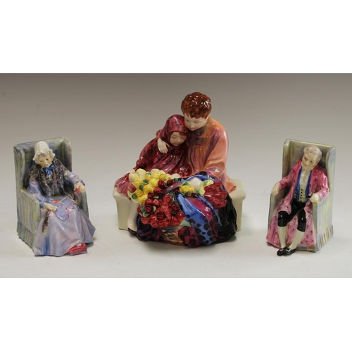 5063 - A Royal Doulton model, The Flower seller's Children, HN1342, 20cm wide; a pair of Royal Doulton figu... 