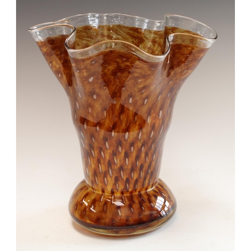 5067 - A large Powell type brown glass vase, fluted rim, spiral bubble inclusions, 30cm