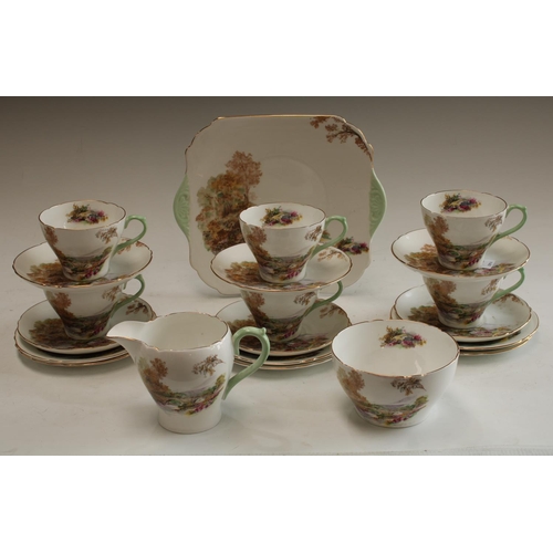 5133 - A Shelley Heather pattern tea service for six comprising cake plate, cream jug, sugar bowl, side pla... 