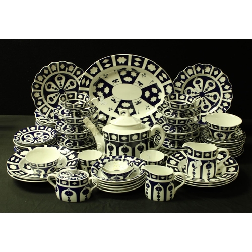 5144 - A Royal Crown Derby blue and white unfinished teapot, milk and sucrier; assorted teacups and saucers... 