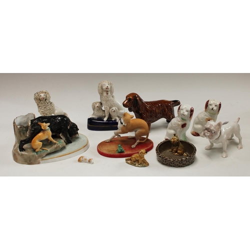 5146 - A Copenhagen B and G bull dog, 1676;  Staffordshire poodles;  Wade dog;  etc (10)