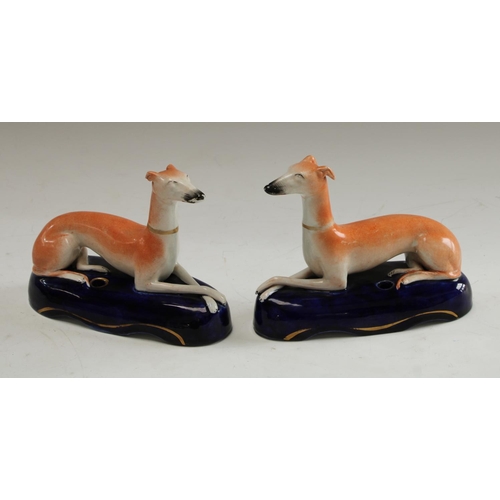 5148 - A pair of 19th century Staffordshire greyhound pen rests, 18cm wide