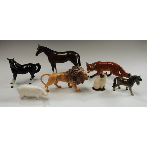 5155 - A Beswick model of a lion; other animal models, fox, Beswick pig Ch. Wall Queen, horses, cat; Goebel... 