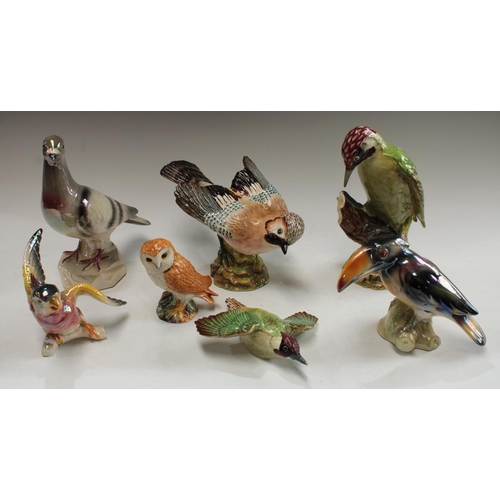 5156 - A Beswick model of a Woodpecker, number 1218, 23cm; others, Jay, number 1219, 15cm; Owl, 12cm; assor... 