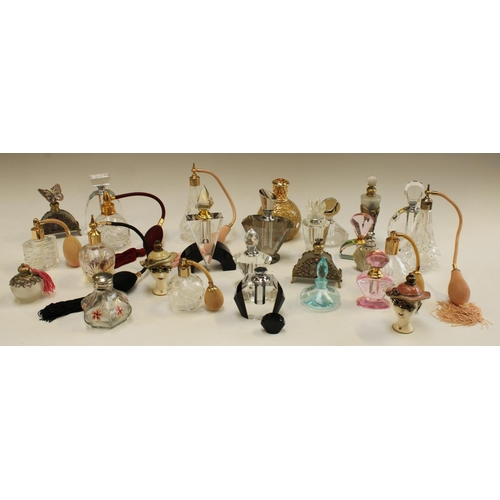 5178 - An Art Deco style faceted glass scent bottle and stopper; others similar; a glass scent atomiser; a ... 