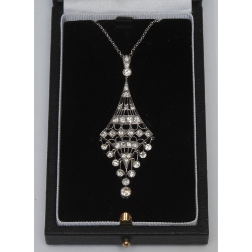 1006 - An Art Deco style diamond pendant necklace, open work inverted diamond encrusted fringe pendant inse... 