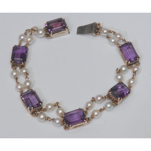 1018 - An amethyst and cultured pearl bracelet, six rectangular cushion cut vibrant purple amethysts, each ... 