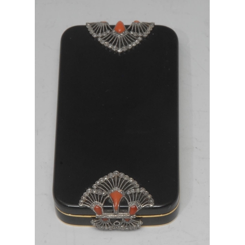 1096 - An Art Deco lady's gold and black lacquered rounded rectangular compact, the hinged cover applied wi... 