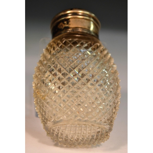 1108 - A 19th century silver coloured metal mounted hobnail-cut clear glass sulphur scent bottle, decorated... 