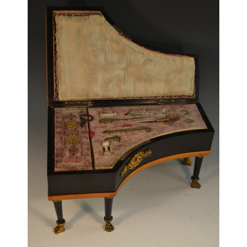 1126 - An early 19th century French ebonised piano sewing etui, the keys in mother-of-pearl, the interior w... 