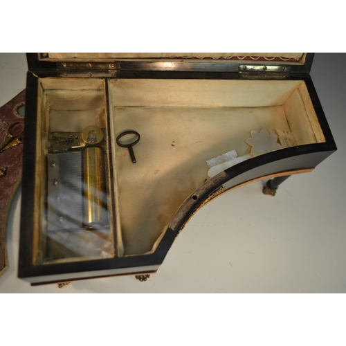 1126 - An early 19th century French ebonised piano sewing etui, the keys in mother-of-pearl, the interior w... 