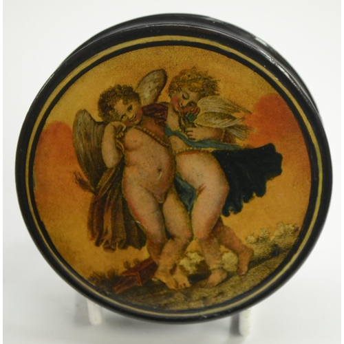 1133 - A 19th century papier-mâché circular table-top snuff box, the cover printed in colour with amorini i... 