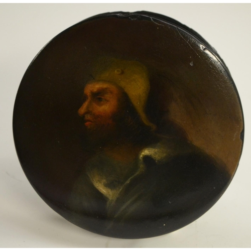 1134 - A 19th century papier-mâché circular table-top snuff box, the push-cover painted with a portrait pro... 