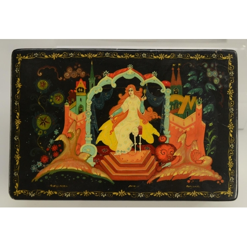 1142 - A large Soviet Russian rounded rectangular table-top box, the hinged-cover well-painted with a princ... 