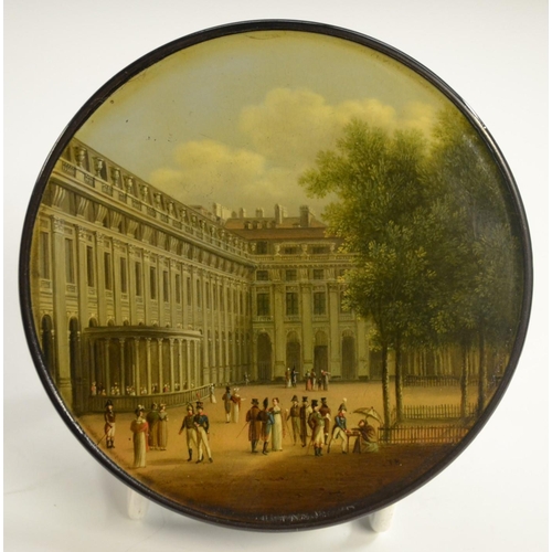 1153 - An early 19th century German Named-View papier-mâché circular table-top snuff box, by Stobwasser of ... 