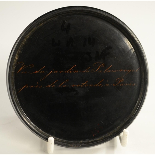 1153 - An early 19th century German Named-View papier-mâché circular table-top snuff box, by Stobwasser of ... 