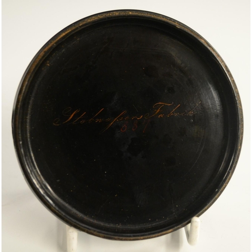 1153 - An early 19th century German Named-View papier-mâché circular table-top snuff box, by Stobwasser of ... 