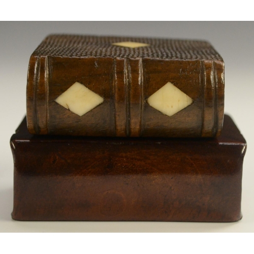 1157 - Treen - a 19th century novelty hardwood snuff box, as a book, checkered sliding cover and base, groo... 