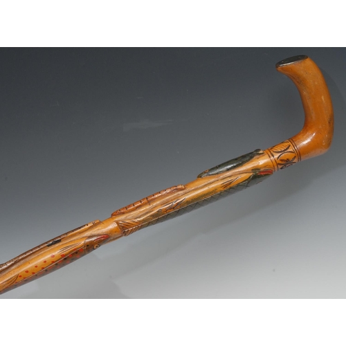 1198 - A 19th century Swedish Folk Art walking stick, carved with fish and eels coloured in polychrome, dat... 