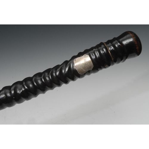 1201 - An unusual oryx horn cane, carved wooden detachable top, silver cartouche inscribed 1937 Cap't F W D... 