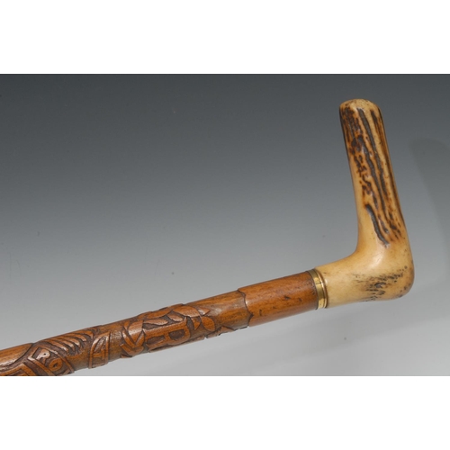 1204 - An early 20th century walking stick, horn handle, the shaft carved with RFC The Royal Scots 1918 and... 