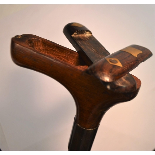 1234 - A 19th century gentleman's novelty snuff box walking stick, the L-shaped rosewood handle with 'puzzl... 