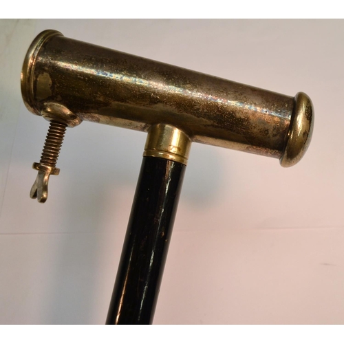 1238 - An early 20th century gentleman's novelty walking cane, the silver plated handle as a clamp, ebony s... 