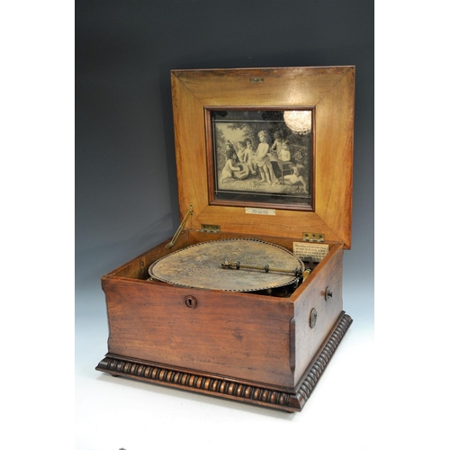 1246 - A 19th century walnut  table-top symphonion, horizontal movement playing steel disks, hinged cover i... 