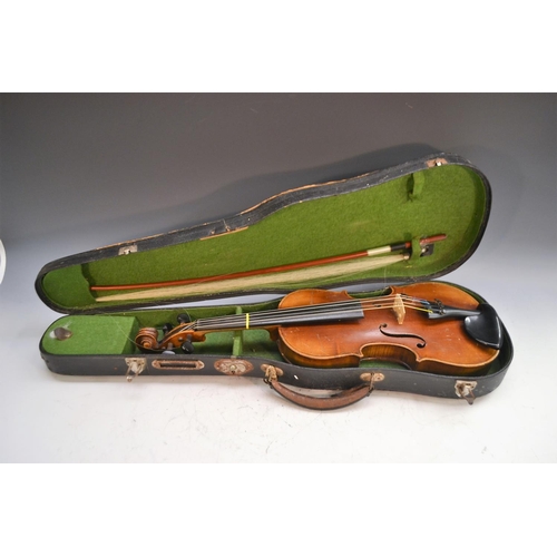 1248 - A 19th century German 3/4 size violin, the two-piece back 33.5cm long excluding button, outlined thr... 