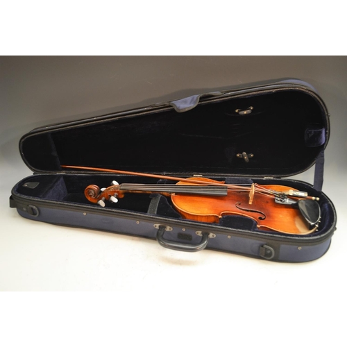 1249 - A 19th century German violin, the two-piece back 36cm long excluding button, marked DT, paper label ... 