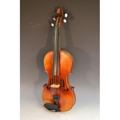 1249 - A 19th century German violin, the two-piece back 36cm long excluding button, marked DT, paper label ... 