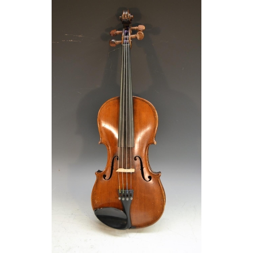 1250 - A 19th century German violin, Guarnerious copy, the two-piece back 35cm long excluding button,  outl... 