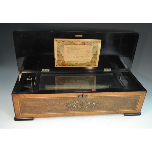 1253 - A 19th century Swiss crossbanded rosewood and marquetry  music box, 33cm cylinder playing twelve air... 