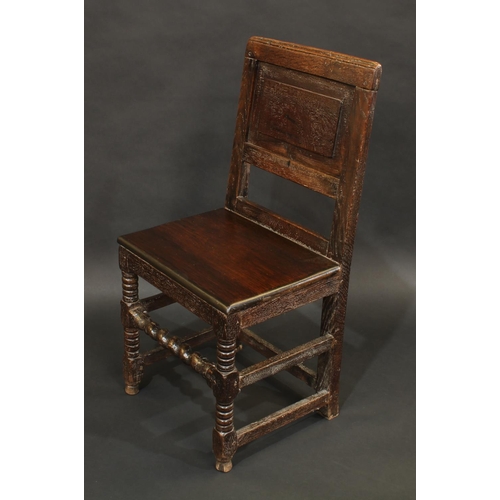 1294 - A 17th century oak wainscote back stool, rectangular panelled back, bobbin and spirally turned legs ... 