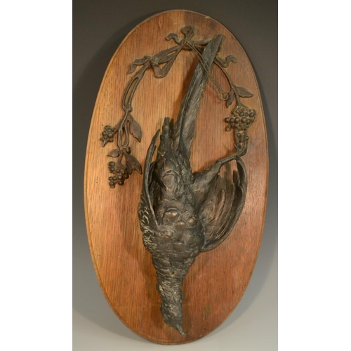 1314 - A 19th century cast bronze hanging dead game, pheasant, each naturalistically case, wall-hanging pli... 