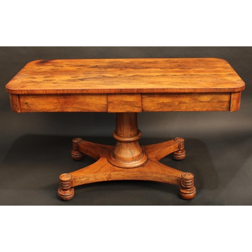 1316 - A George/William IV rosewood library table, rounded rectangular top above a pair of frieze drawers, ... 