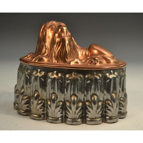 1328 - A 19th century copper and tin novelty jelly mould, as a recumbent lion, 16cm long