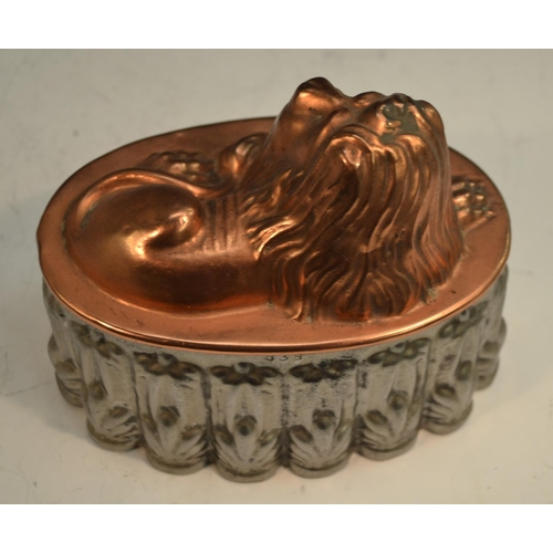 1328 - A 19th century copper and tin novelty jelly mould, as a recumbent lion, 16cm long