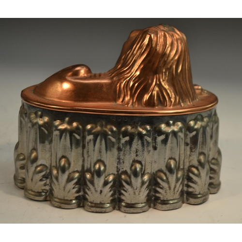 1328 - A 19th century copper and tin novelty jelly mould, as a recumbent lion, 16cm long