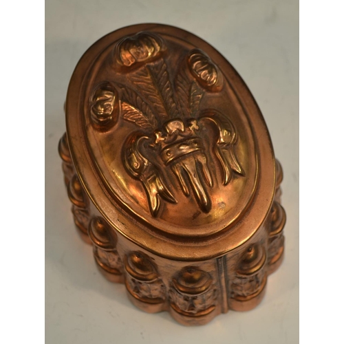 1332 - A 19th century copper novelty jelly mould, embossed with Prince of Wales feathers, the fluted side w... 