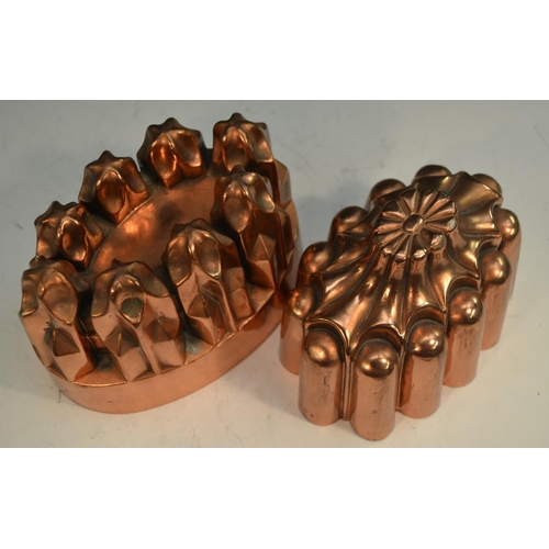 1333 - A 19th century copper oval 'castle' jelly mould, 17.5cm long; a 19th century copper fluted oval jell... 