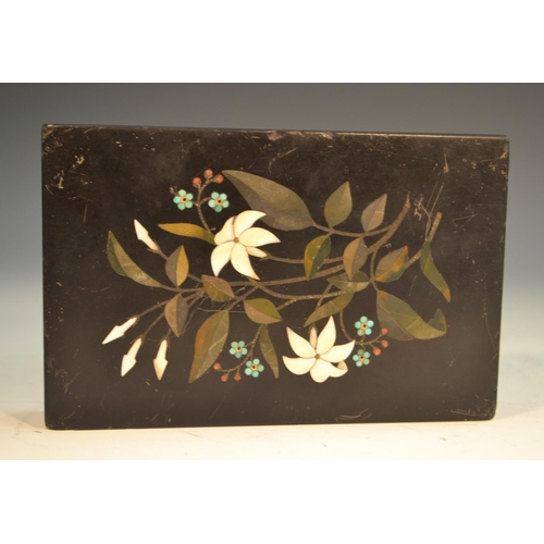 1335 - A 19th century Derbyshire Ashford marble rectangular desk weight, inlaid with a spray of lilies, 14c... 