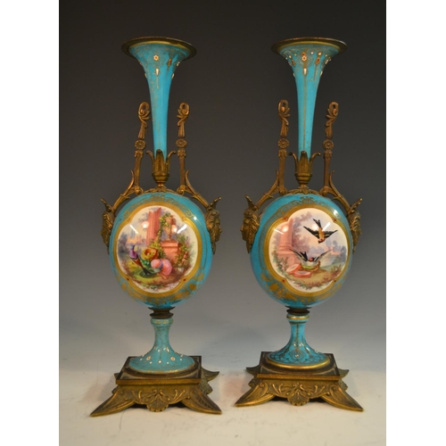 1354 - A 19th century French Sevres style clock garniture, the enamelled dial with Roman numerals, blue cel... 